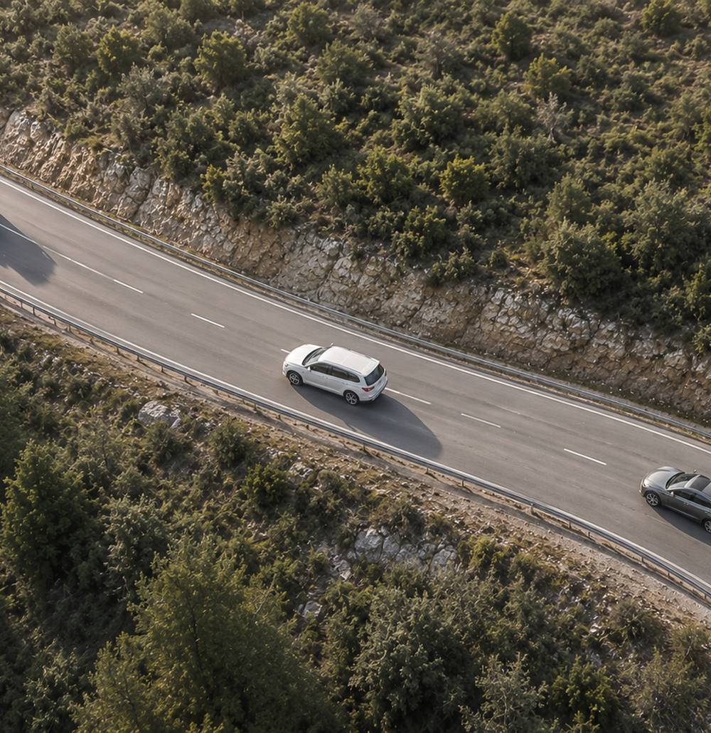 Fleet vehicles on a mountain road